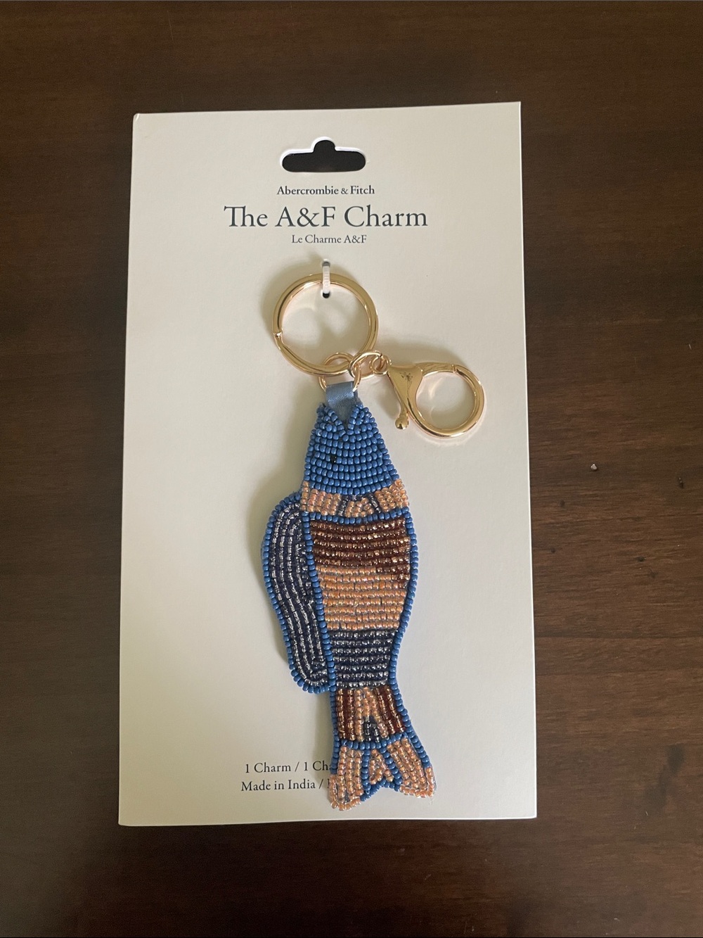 Abercrombie & Fitch Blue and Tan Beaded Fish Bag Charm with Gold Hardware